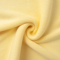 Detail of the soft light yellow knit fabric showing premium texture and ribbed elasticity - S / Assorted Colors (Stock)