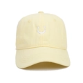 Kids cotton baseball cap in light yellow featuring a white embroidered smiley face - Kids 52-54cm / Yellow