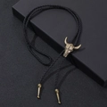 Detail of a vintage bronze bull skull bolo tie on black braided leather cord and gift box - One Size / Antique Bronze Bull Skull