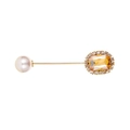 Elegant gold-tone brooch pin featuring amber rectangular crystal and white pearl - Champagne