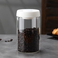 Vacuum sealed borosilicate glass jar with a white lid and push button for coffee beans - 40oz / Transparent Bottle / White