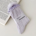 Light purple cable knit socks for women featuring elegant ruffled cuffs and a minimalist design - Light Purple