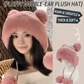 Pink winter plush hat with cute deer ears and large decorative pom poms on side ties - Rendered Four Pom Plush Hat / Pink