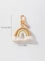 Handmade rainbow keychain detail with cotton rope tassels and gold metal hook - Off White