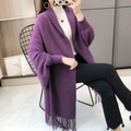 Close-up of the elegant purple knit shawl with detailed fringe and soft texture - Purple