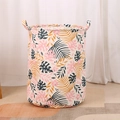 Large fabric storage basket with tropical leaf patterns and dual reinforced handles - 35*45cm / Palm Leaf