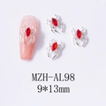 Macro detail of 9x13mm silver spider nail art charm with a vibrant red marquise stone - Silver Base Red Stone (AL98)