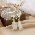 Elegant gold earrings with white translucent petals and crystal accents on glassware - French Luxury Petal Long Ear Hook Style (E1039-1)