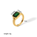 Gouden titanium ring met smaragdgroene zirkoon en gedraaide band inclusief afmetingen - Maat 6 / Gouden Groene Edelsteen (TR4156-G-6)