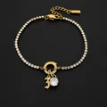 Gold stainless steel tennis bracelet with rhinestone pendant and gothic letter charm - Letter Z
