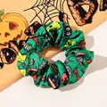 Close-up of green satin scrunchie with pumpkin and spider patterns for Halloween - No. 8 Large Scrunchie / Large Size