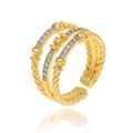 Close-up of twisted 18K gold plated multi-layer ring with sparkling zircon stones - Adjustable Open / Multi-Layer Rope Twist Style (CXJ-1432)