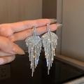 Silver U-shaped tassel earrings with pearls and crystals in a leaf design finish - Silver Leaf Tassel (Silver Earring Post)