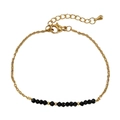 Minimalist gold-tone bracelet with faceted black beads and adjustable lobster clasp - Black