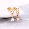 Gold titanium drop earring with hollow heart pendant and sparkling clear zircons - Gold