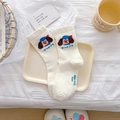 Creamy white mid-calf socks with cute cartoon puppy embroidery and green typography - Glasses Dog