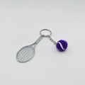 Tennis racket keychain featuring a mini silver metal racket and purple felt ball charm - 4.8cm*3.8cm / Metal Tennis Keychain Purple