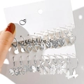 Silver metal earring set with heart and butterfly charms on white card display - Silver Heart Butterfly Enamel Style (5619902)