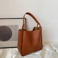 Minimalist brown soft leather tote bag with wide shoulder strap and silver rivets - Brown