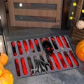 3D Halloween bath mat featuring a spooky black skull and skeleton hands design - 40*60cm / Red