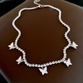 Elegant silver butterfly pendant necklace featuring sparkling zircons on a leather pad - Zircon Butterfly Pendant Style (Silver)