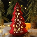 Red Christmas tree lamp with cutout holiday patterns on a round wooden base - Christmas Tree / Red