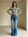 Slim fit striped knit top paired with high-waisted blue button-fly flare jeans - XS / Light Blue