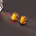 Vintage style yellow amber resin earrings with micro-set coffee crystals and dimensions - K-0624 Malay Jade Style Stud Earrings