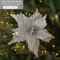 Glimmering silver Christmas poinsettia flower ornament with glitter on a festive tree - Silver