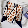 Cream narrow silk scarf with orange floral print and navy blue borders - Orange Flowers