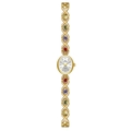 Luxurious gold metal watch featuring colorful rainbow gemstones on a link bracelet - Luxury Gold