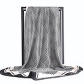 Elegant black and white houndstooth silk scarf on a minimalist display stand - 90*90cm / Houndstooth