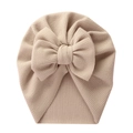 Beige waffle knit baby turban hat with a large bow detail for newborns and infants - Khaki