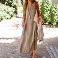 Boho linen maxi dress with V-neck and pockets in earthy tone shown in outdoor setting - S / Tops / Khaki