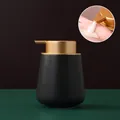 Nordic matte black ceramic soap dispenser with gold pump and liquid lotion detail - Rounded / Speckled Black with Gold Pump