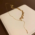 Minimalist gold wheat sequin necklace with leaf charms on a premium display box - Necklace / Gold