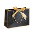 Elegant black paper gift bag with golden ribbon bow and sturdy gold rope handles - XS (19x15x7cm) / Gold Frame Black