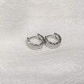 Silver geometric faceted huggie hoop earrings on white textured fabric background - Silver Geometric Faceted Hoop (47#)