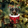 Kreativer Weihnachts-Dackel-Anhänger mit Rentiergeweih in einer roten Socke - Dackel Typ 2