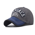 Close-up of military embroidery on a vintage grey and blue cotton baseball cap - Adjustable / Washed Grey