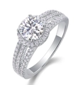 Macro shot of 925 sterling silver halo ring featuring round cut moissanite and pave accents - US 7 / Pave Halo Round Style (R13050)