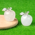 Mini translucent white crystal apple pendant with silver leaf on green grass background - White Crystal
