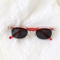Retro cat-eye sunglasses with transparent and red frames and dark lenses - Clear with Red Legs