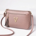 Stylish women's crossbody shoulder bag with metal V logo, multi-pocket PU leather design. - Oak Red