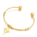 Elegante bracciale rigido dorato aperto con ciondolo a stella a otto punte vuota - Oro