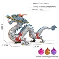 Chinese silver dragon mythical beast figurine with blue accents and red flame base - Silver