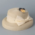 Detail of beige straw sun hat with sheer ribbon, pearls and elegant bow decoration - M (56-58cm) / Beige