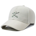 Beige cotton baseball cap with green K letter embroidery for a minimalist casual look - Light Beige