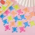 Colorful plastic jumping frog toys for kids in green, pink, blue and orange colors - Jumping Frog