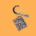 Silicone bead keychain bracelet with sunflower print leather card holder and tassel - Sunflower